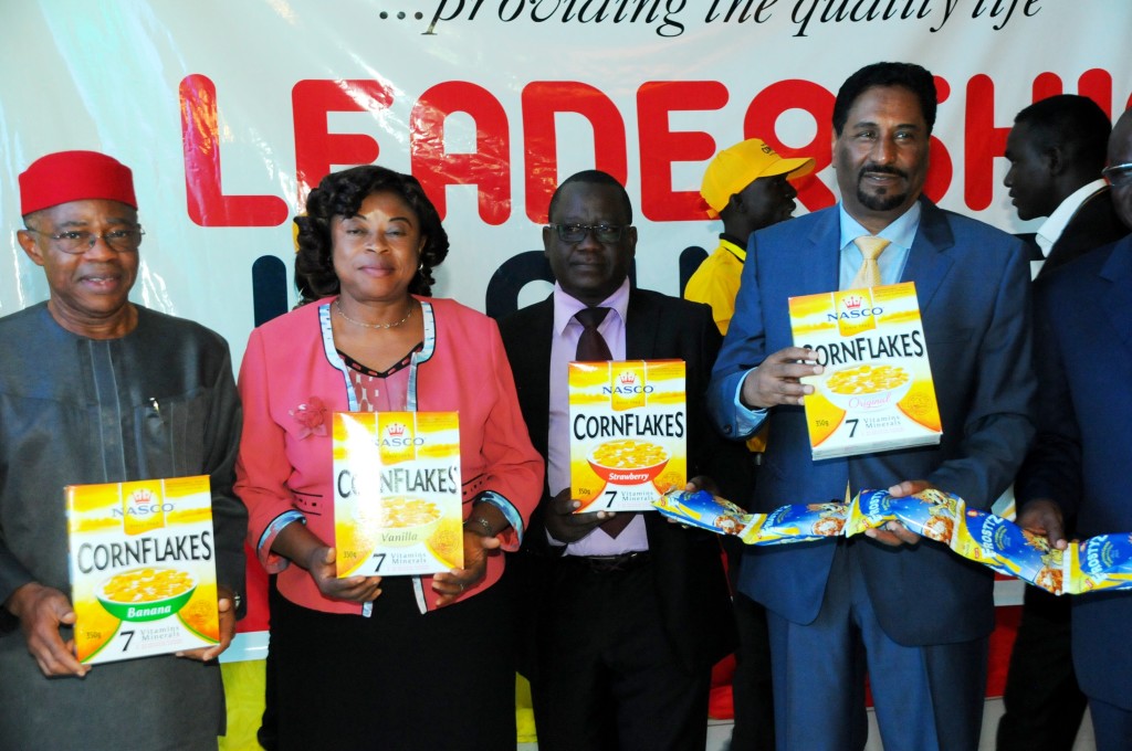  L-R: National President, Manufacturers' Association of Nigeria (MAN) Dr. Frank Jacobs; National President, Nutrition Society of Nigeria (NSN) Prof. Ngozi Nnam; Mr. Thomas Chollom, Permanent Secretary, Ministry of Commerce & Industry Plateau State, who represented Plateau State Governor; and Chairman/CEO NASCO Group Nigeria, Dr. Attia Nasreddin stand together to display the new NASCO Cornflakes pack, re-launched and unveiled in Jos recently