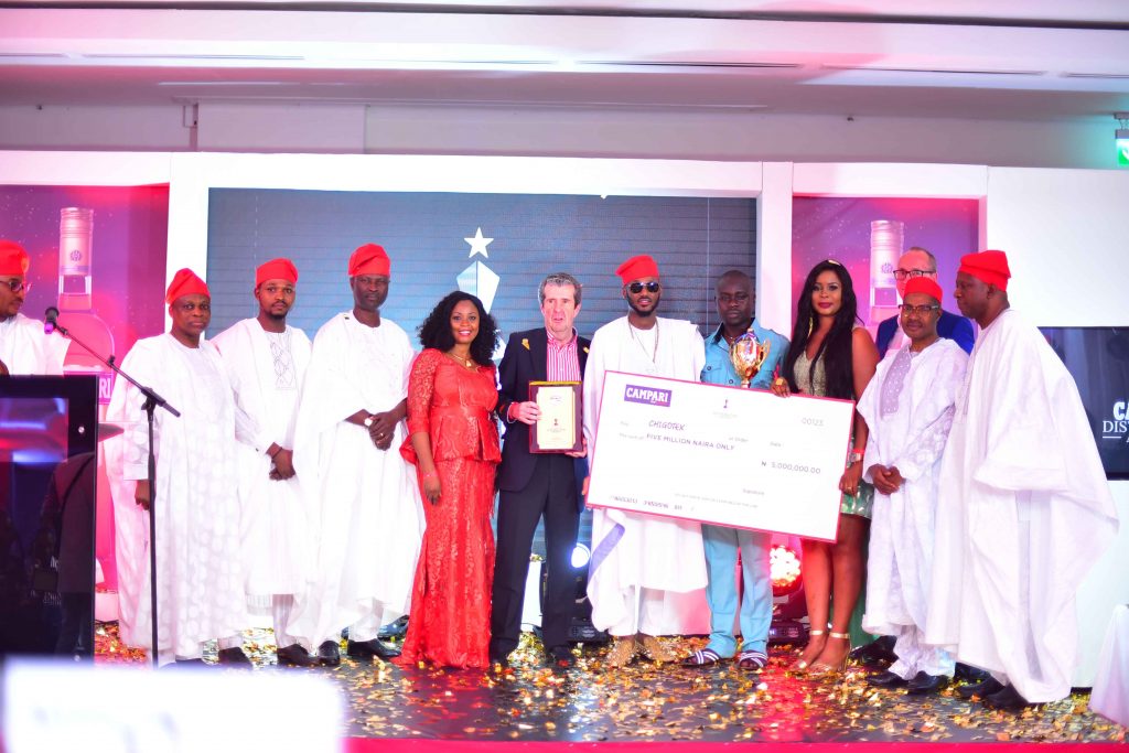 Campari Distributor Awards First prize winner,Mr Chigozie Anagwu fanked by Brian Munro Management team