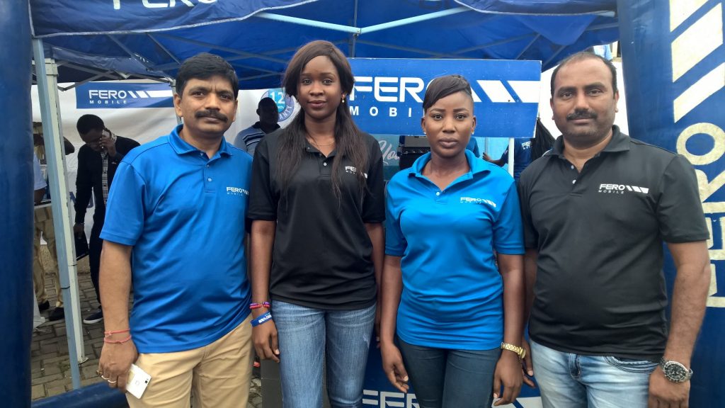 From Left, Mr. Ratnesh Prasad, Country Marketing Manager, Fero Mobile, Ms. Omini Natalie, Sales Consultant, Ms. Otun Omobolanle, Sales Consultant and Mr. Pandian Annamalai, Sales Manager, Fero Mobile at the Fero activation stand during the May Day worker's rally at the Agege Staduium in Lagos.
