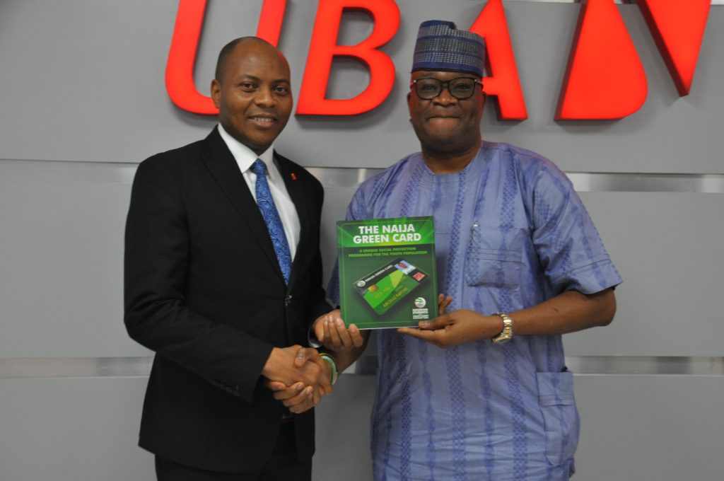 L-R: Founder Naija Green Card, Abimbola Daramola and Head Digital & Consumer Banking, United Bank for Africa (UBA) Group, Mr. Yinka Adedeji, during the official launch of the Naija Green Card Prepaid Card at the UBA house, Lagos